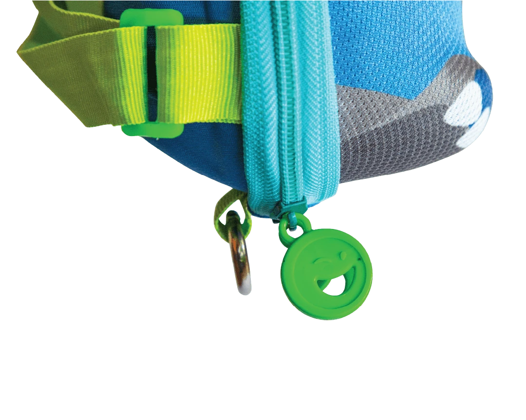Rex, Blue dinosaur-shaped backpack close-up view of green smiley-face zipper