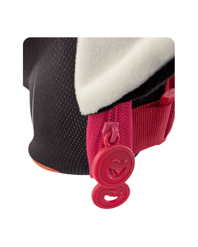 Waddle backpack Close-up of the red smiley face zipper